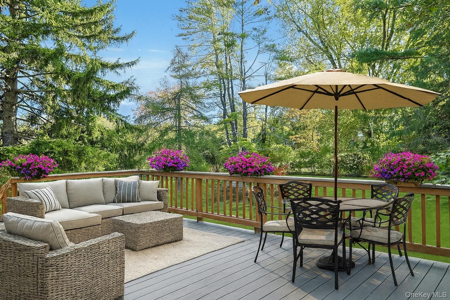 78 Croton Dam Road Ossining, NY 10562 - Photo 28 of 37 a view of a dining tables and chairs in the patio
