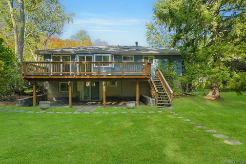 a view of a house with a swimming pool