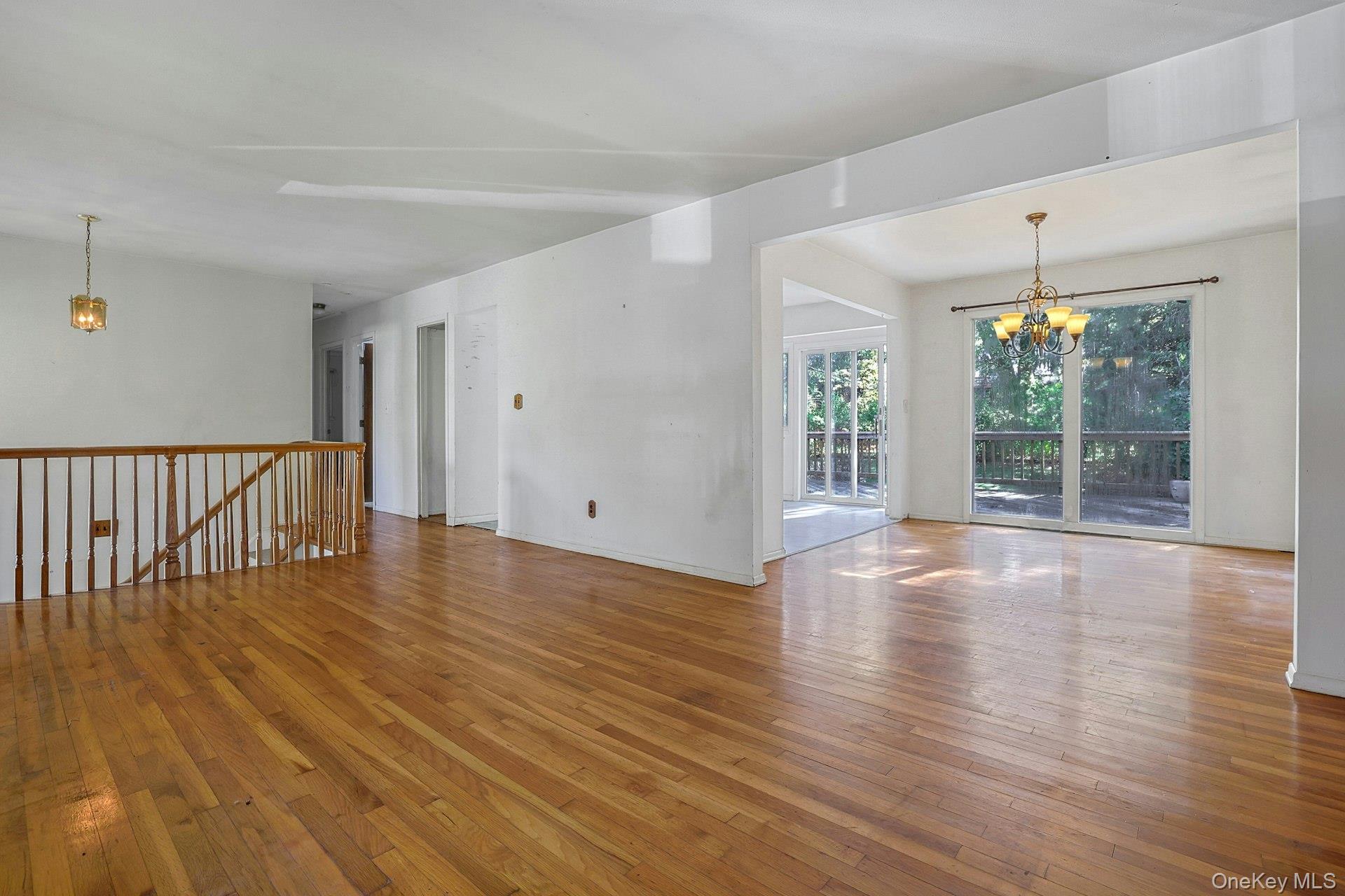 78 Croton Dam Road Ossining, NY 10562 - Photo 7 of 37 a view of an empty room with wooden floor and a window