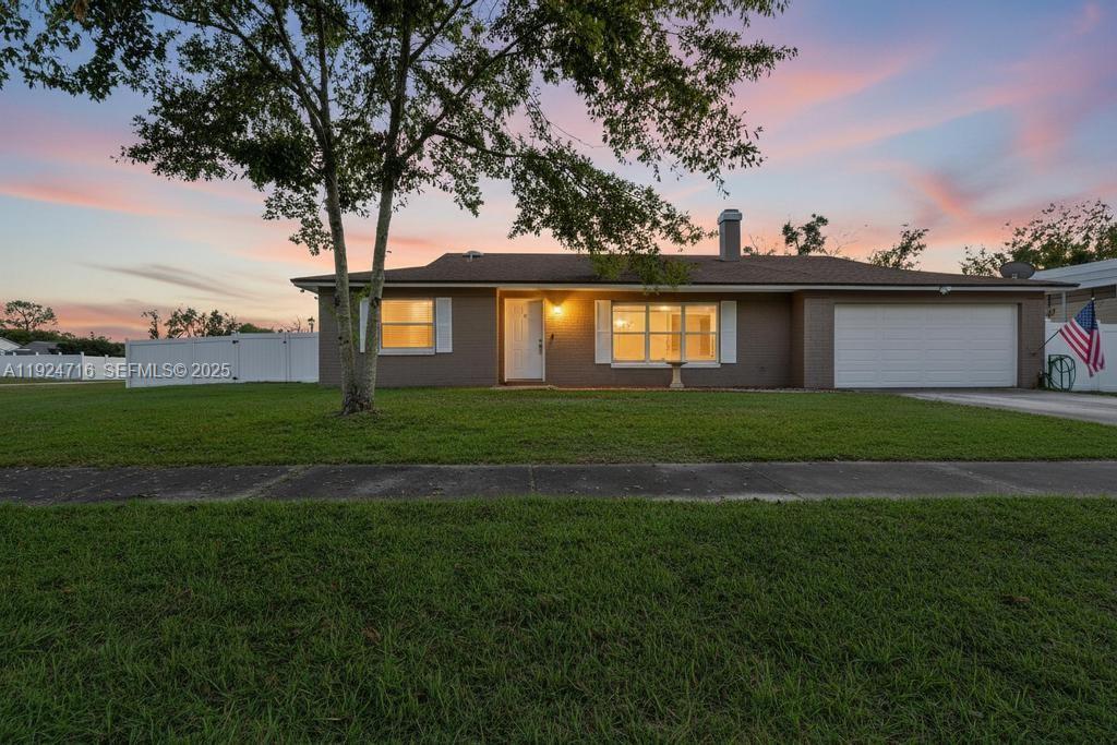a house view with a garden space