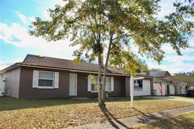 a view of a house with a patio