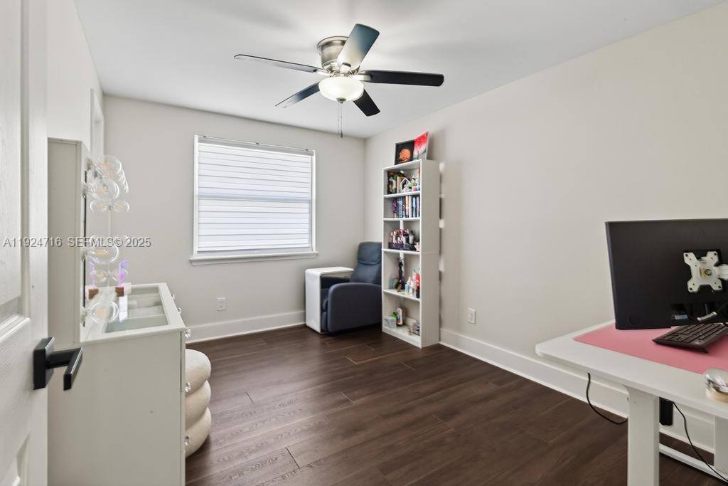 8210 Sailmaker Lane Jacksonville, FL 32210 - Photo 41 of 61 a living room with furniture and a flat screen tv