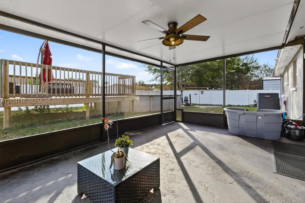 8210 Sailmaker Lane Jacksonville, FL 32210 - Photo 58 of 61 a view of a balcony with couches potted plants with wooden floor