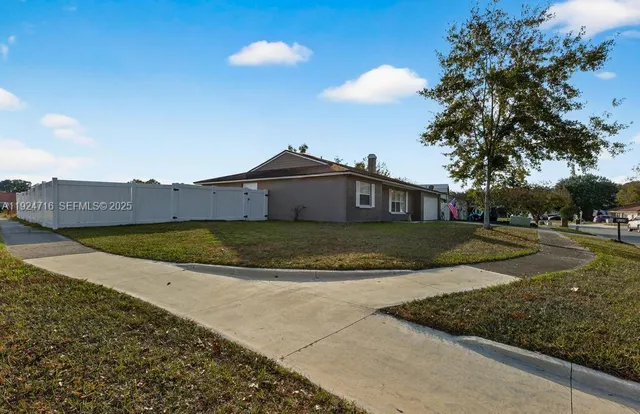 a view of a lake from a yard