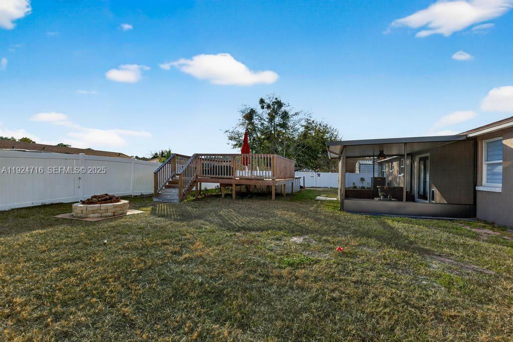 8210 Sailmaker Lane Jacksonville, FL 32210 - Photo 10 of 61 a view of a house with backyard