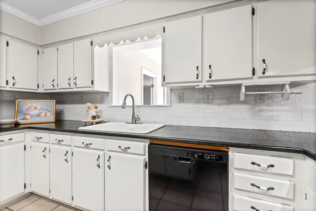 a view of an entryway with a chandelier