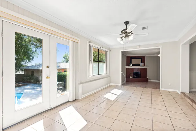 a view of an empty room and window