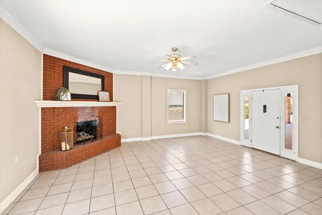 a view of a livingroom with a furniture wooden floor and a chandelier