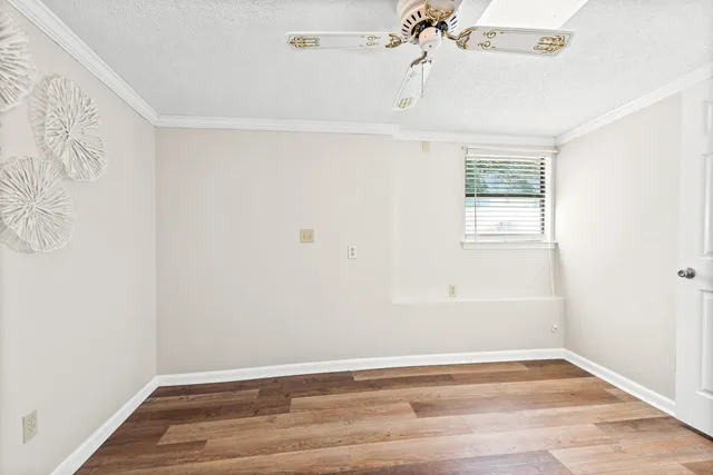 a view of a house with backyard porch and sitting area