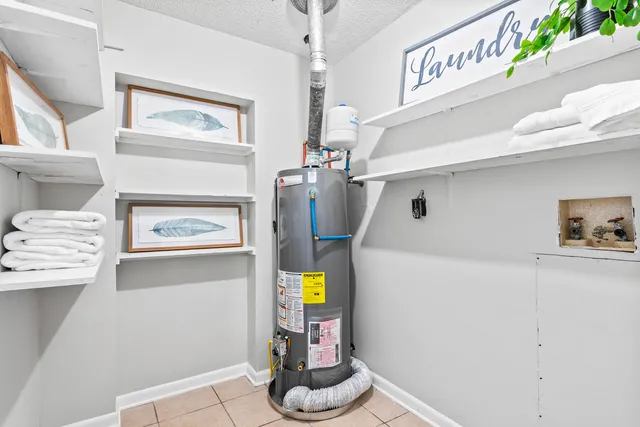 a view of backyard with a garden and trees