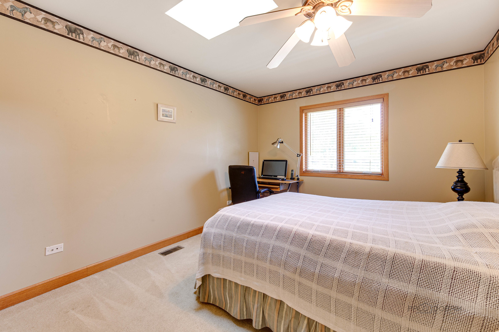 1865 Everett Avenue Des Plaines, IL 60018 - Photo 19 of 38 a bedroom with a bed and a window