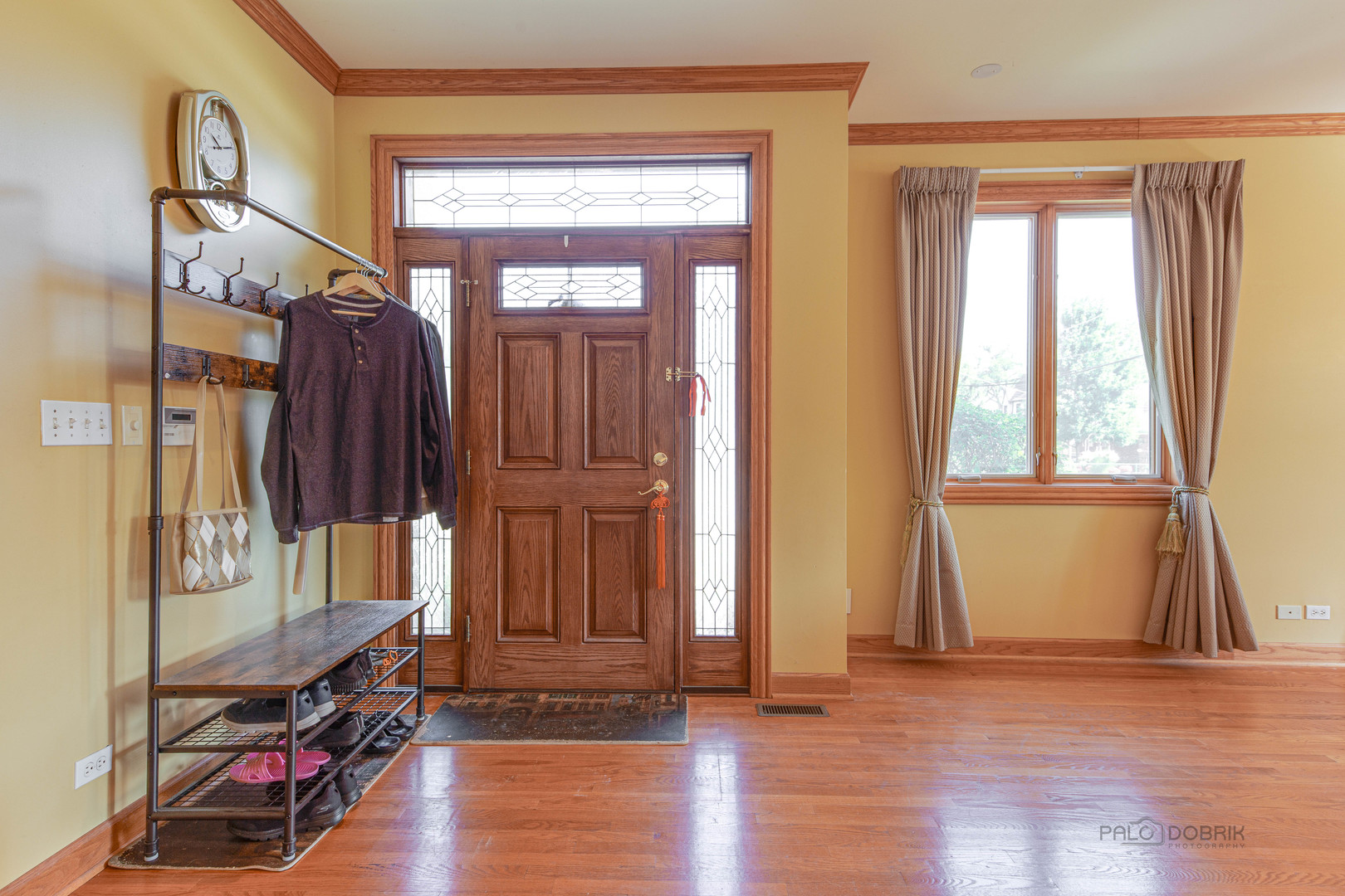 1865 Everett Avenue Des Plaines, IL 60018 - Photo 4 of 38 an entryway with wooden floor and cabinet