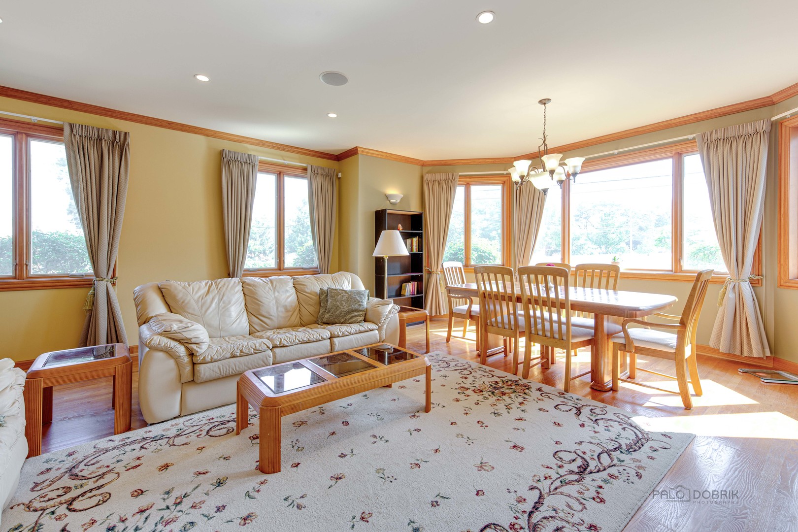 1865 Everett Avenue Des Plaines, IL 60018 - Photo 7 of 38 a living room with furniture and a floor to ceiling window