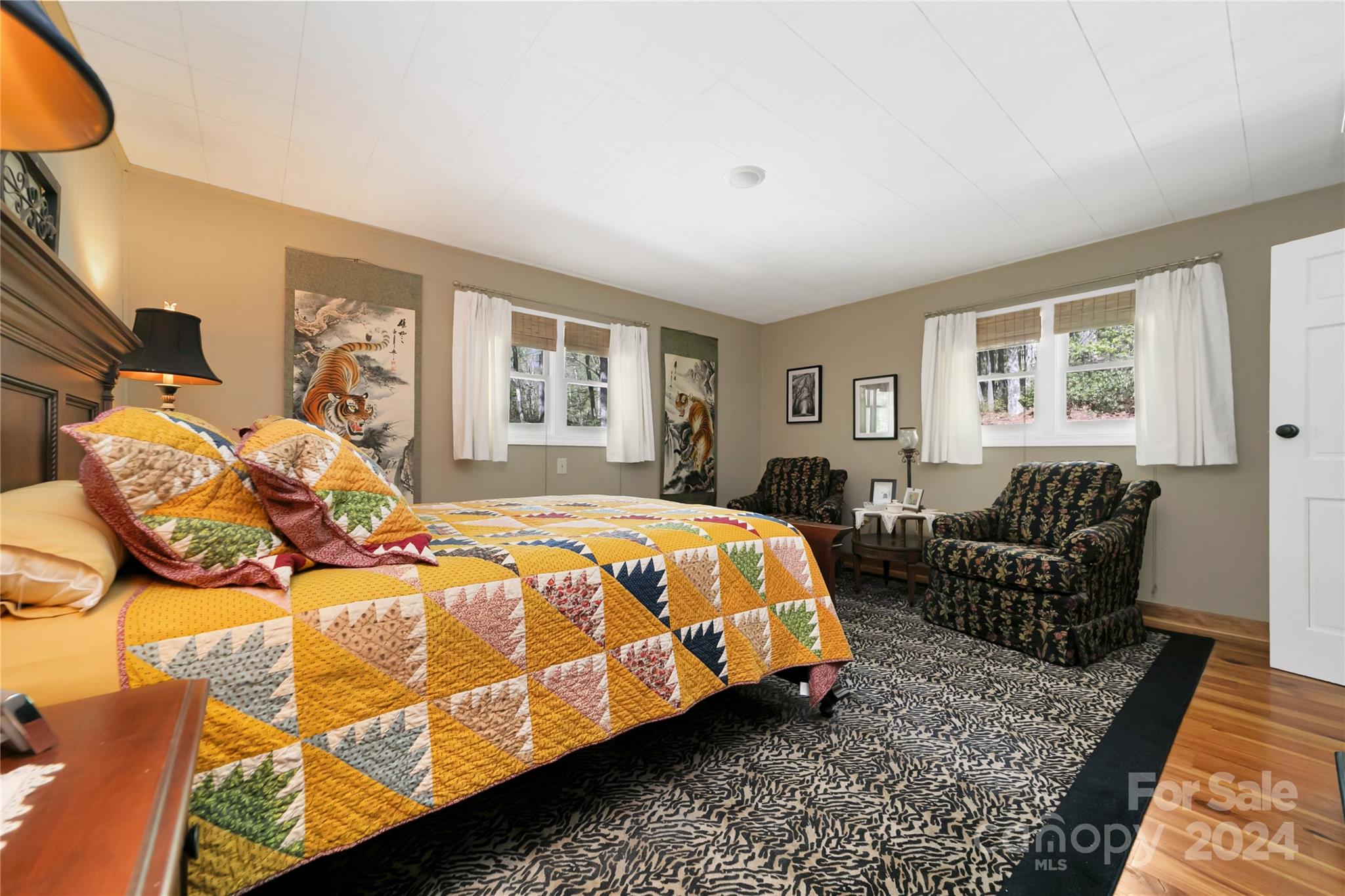 50 Summer Road Cedar Mountain, NC 28718 - Photo 17 of 41 a bedroom with a bed chair and window