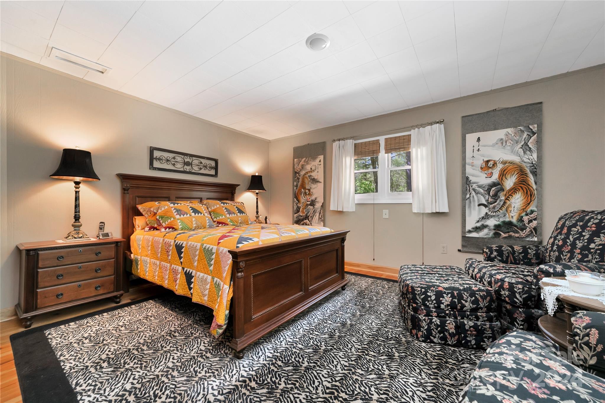 50 Summer Road Cedar Mountain, NC 28718 - Photo 18 of 41 a bed room with a bed and a couch