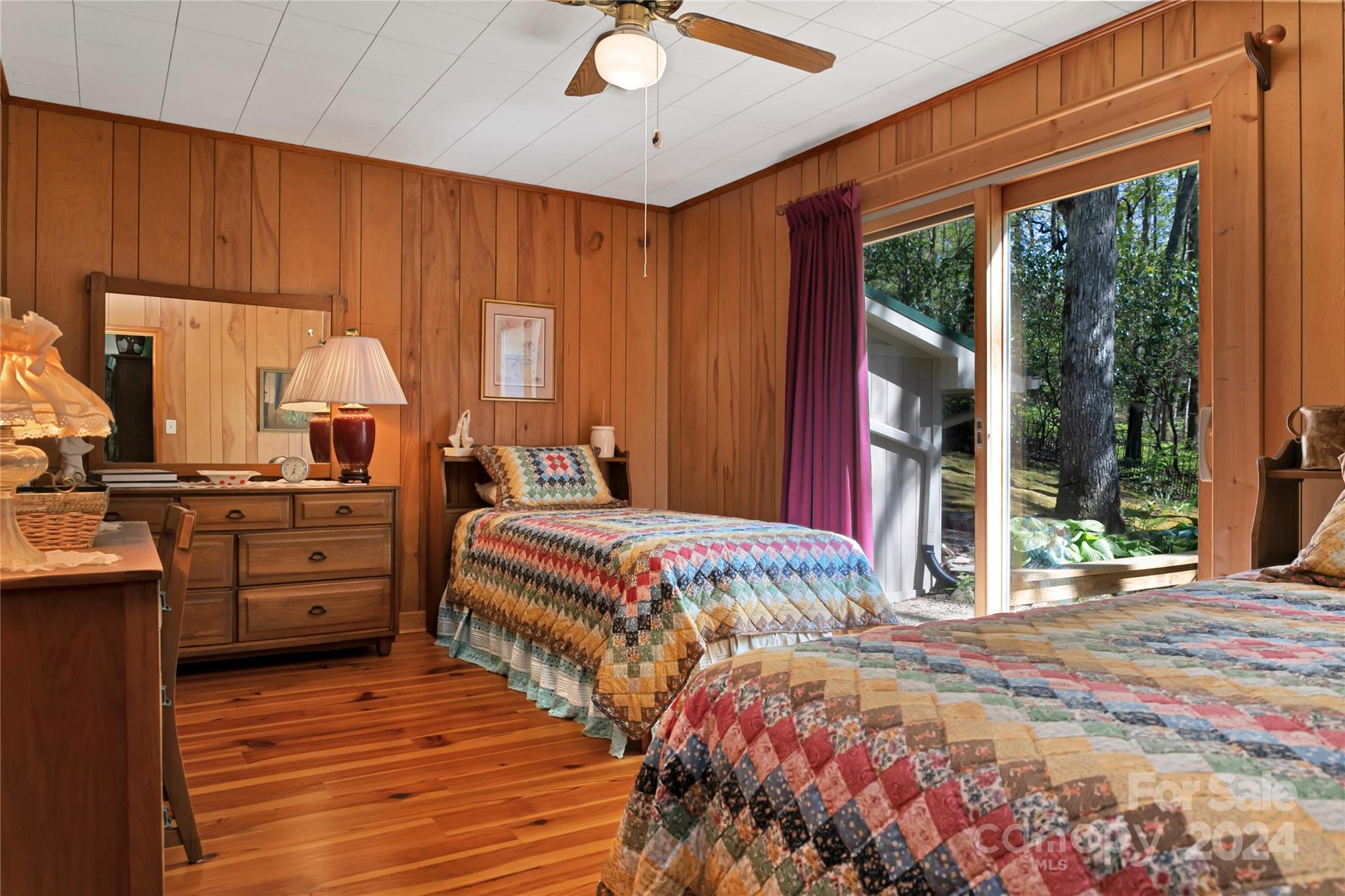 50 Summer Road Cedar Mountain, NC 28718 - Photo 24 of 41 a bedroom with a bed and a large window
