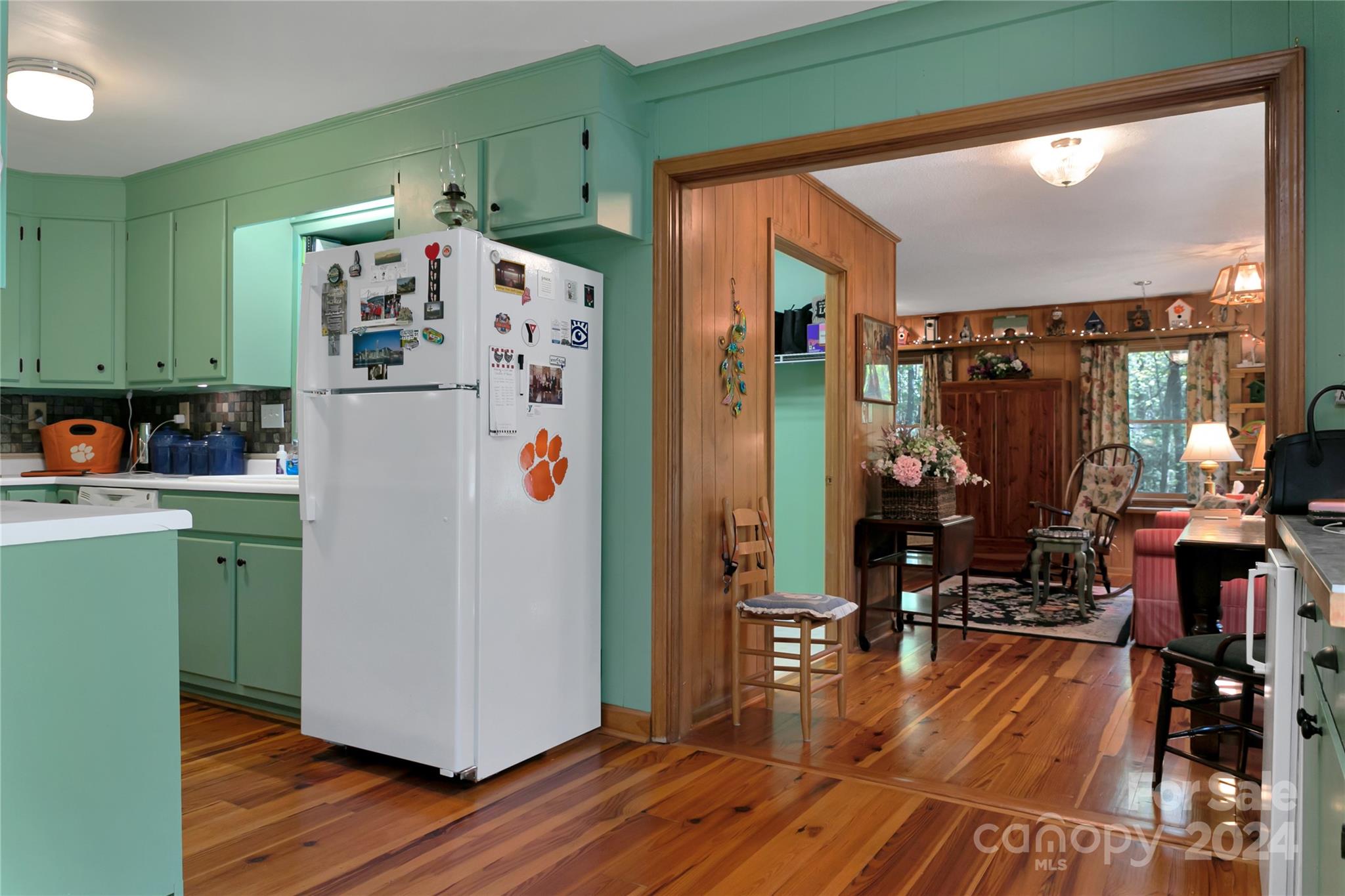 50 Summer Road Cedar Mountain, NC 28718 - Photo 27 of 41 a white refrigerator freezer sitting inside of a kitchen