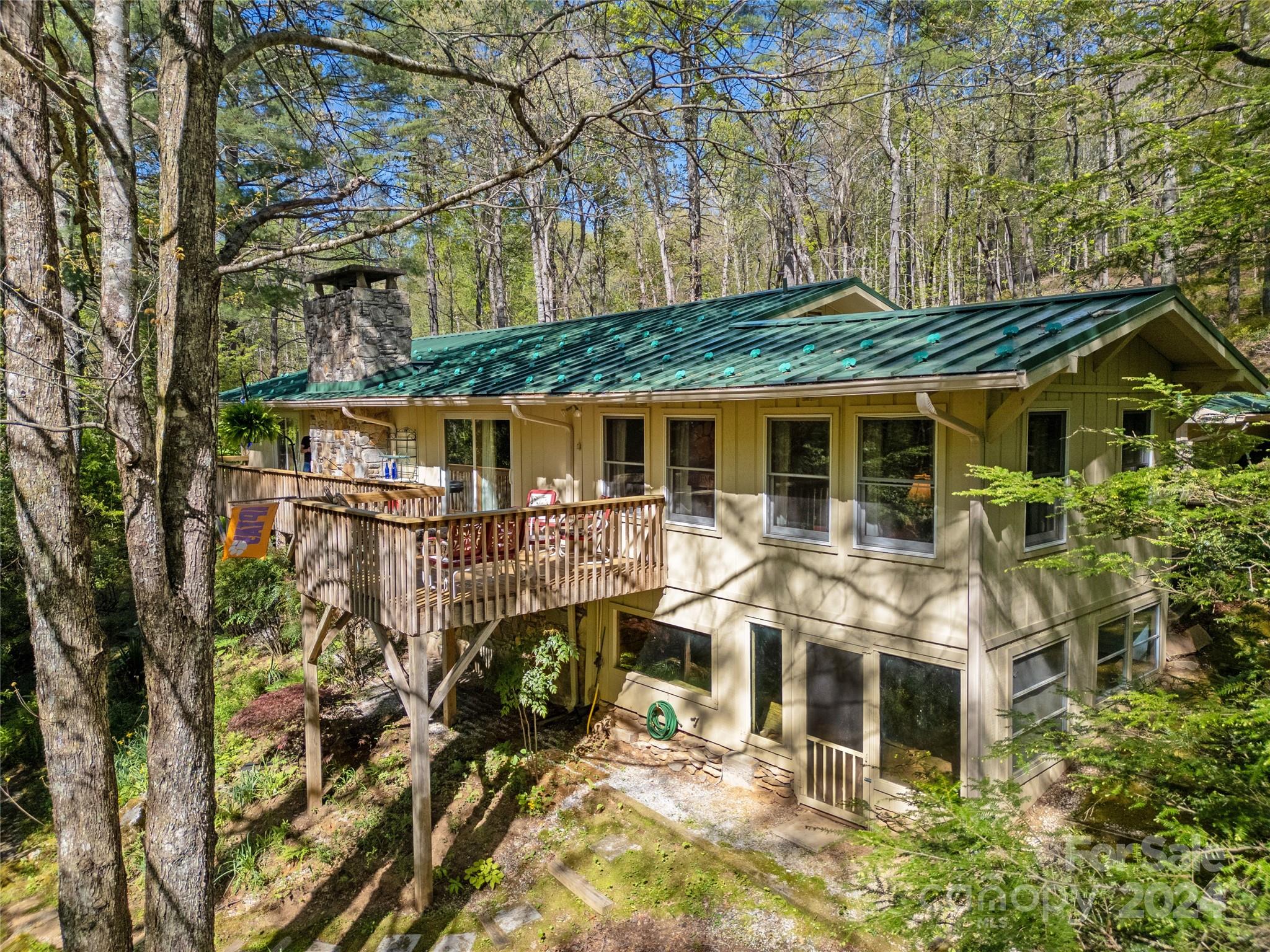 50 Summer Road Cedar Mountain, NC 28718 - Photo 3 of 41 front view of house with a tree in front of it