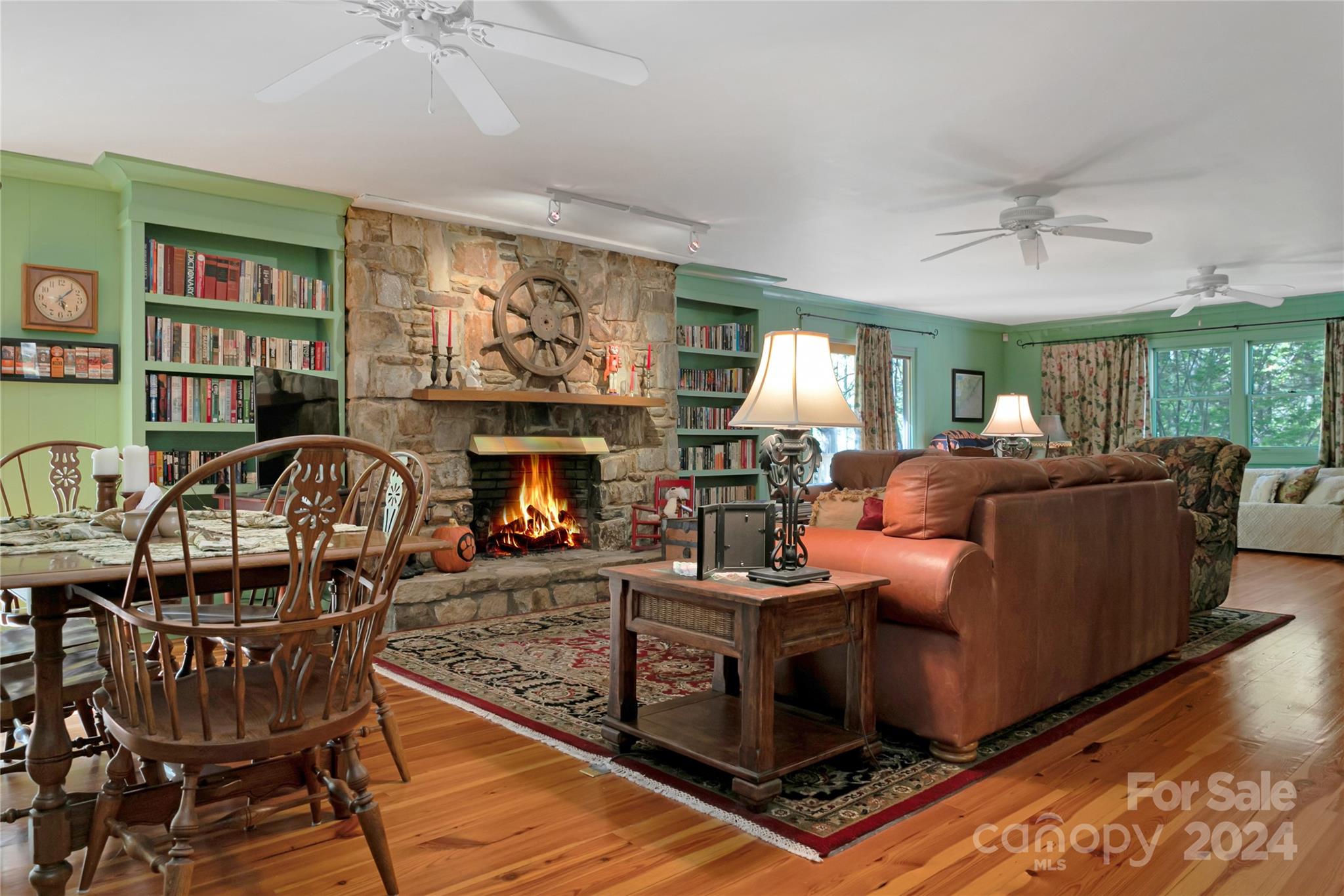 50 Summer Road Cedar Mountain, NC 28718 - Photo 8 of 41 a living room with furniture and a fireplace