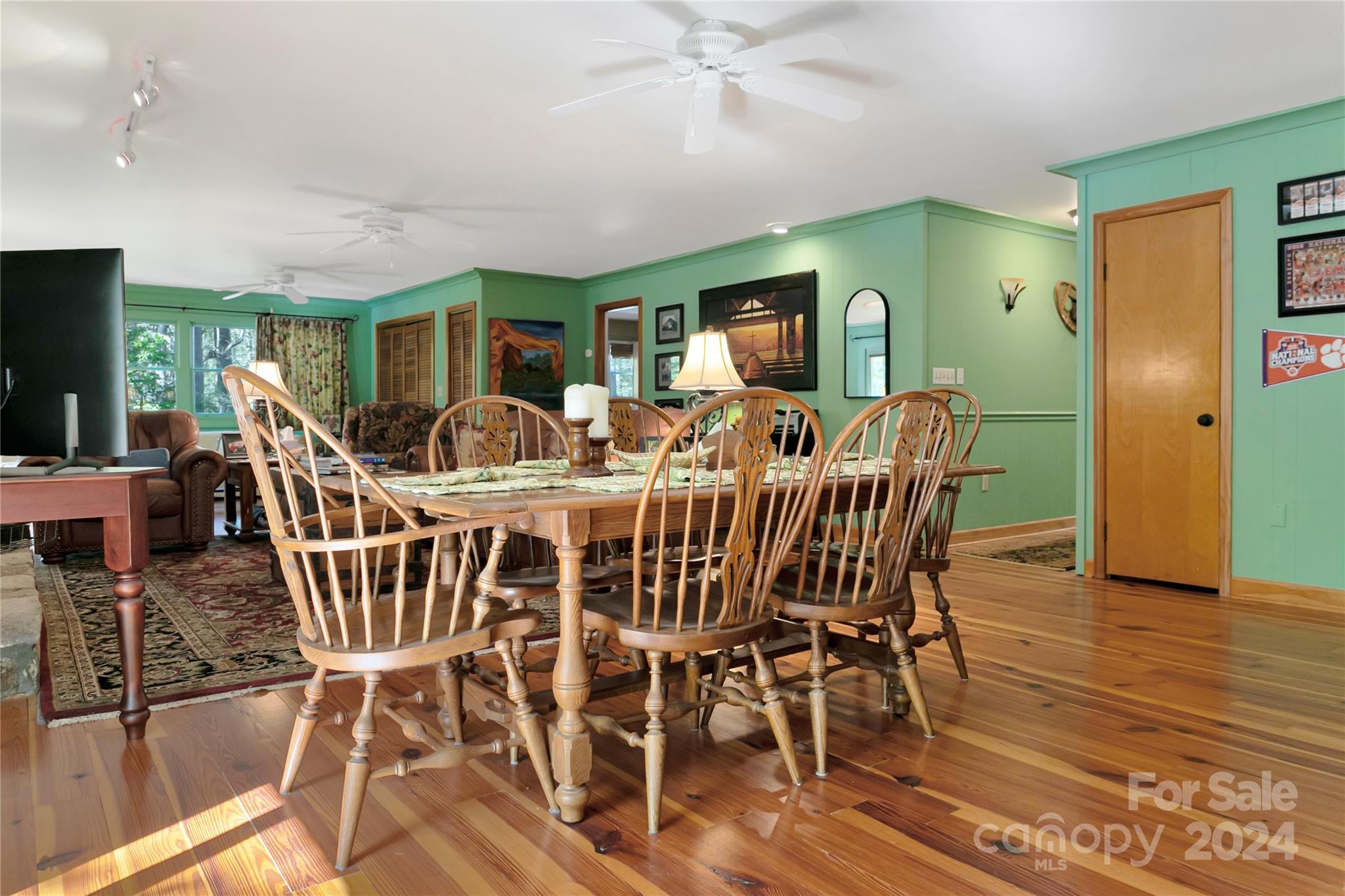 50 Summer Road Cedar Mountain, NC 28718 - Photo 9 of 41 a view of a dining room with furniture window and wooden floor