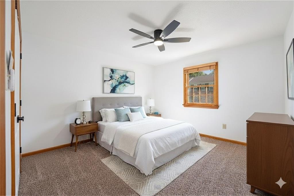 108 Unity Square Greensburg, PA 15601 - Photo 21 of 43 a bedroom with a bed and a painting on the wall