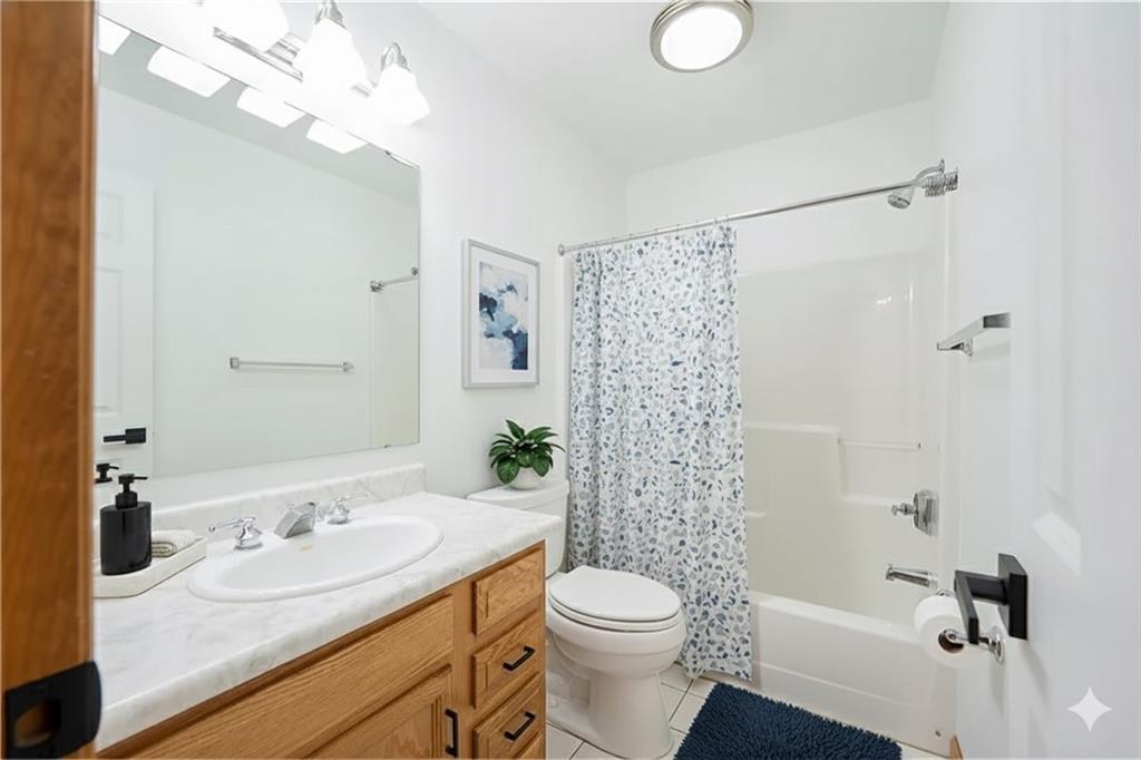 108 Unity Square Greensburg, PA 15601 - Photo 24 of 43 a bathroom with a granite countertop sink a toilet and shower