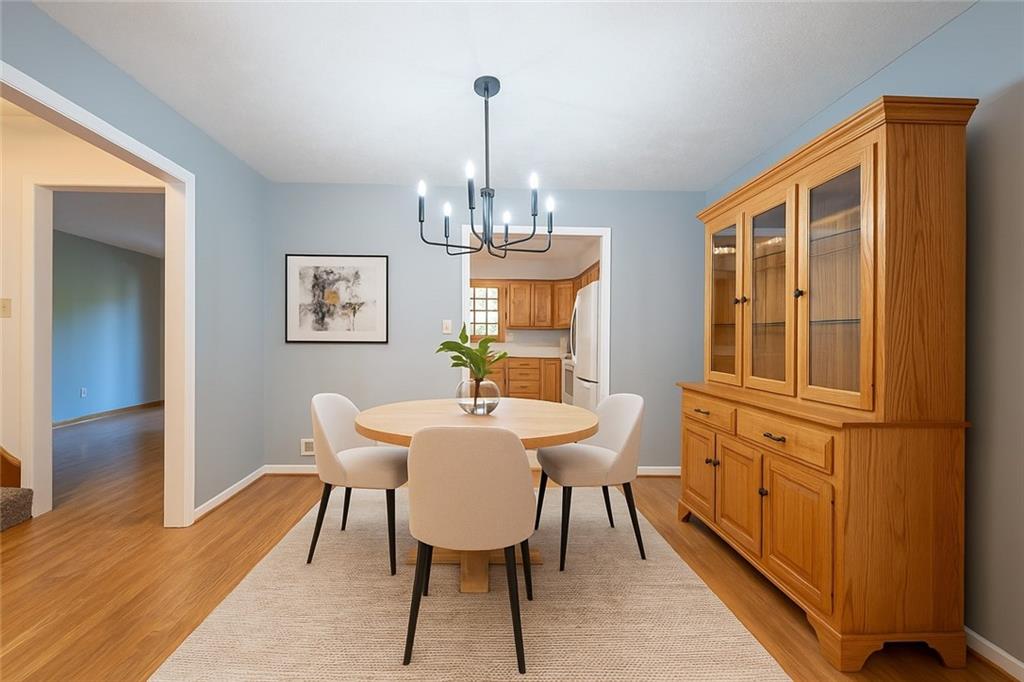 108 Unity Square Greensburg, PA 15601 - Photo 10 of 43 a view of a dining room with furniture window and wooden floor