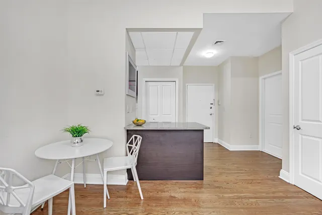 a view of kitchen with table and chair