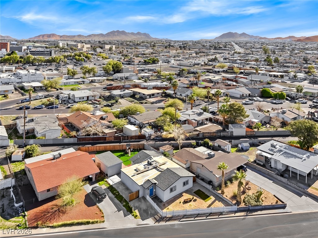 111 Copper Street Henderson, NV 89015 - Photo 19 of 47 Aerial perspective of suburban area featuring a mountainous background