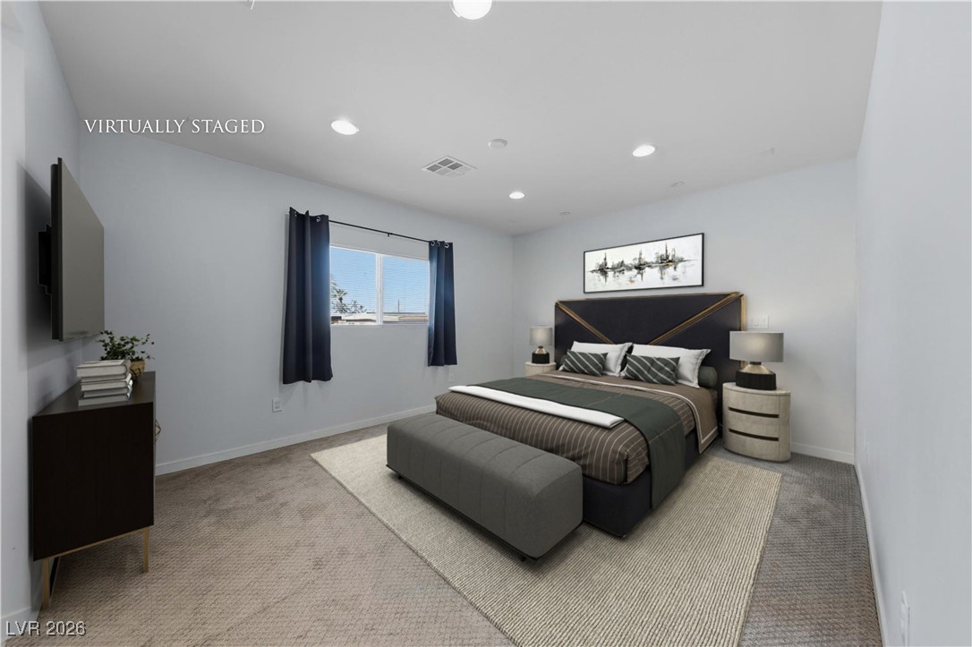 111 Copper Street Henderson, NV 89015 - Photo 2 of 47 Bedroom with light colored carpet and recessed lighting