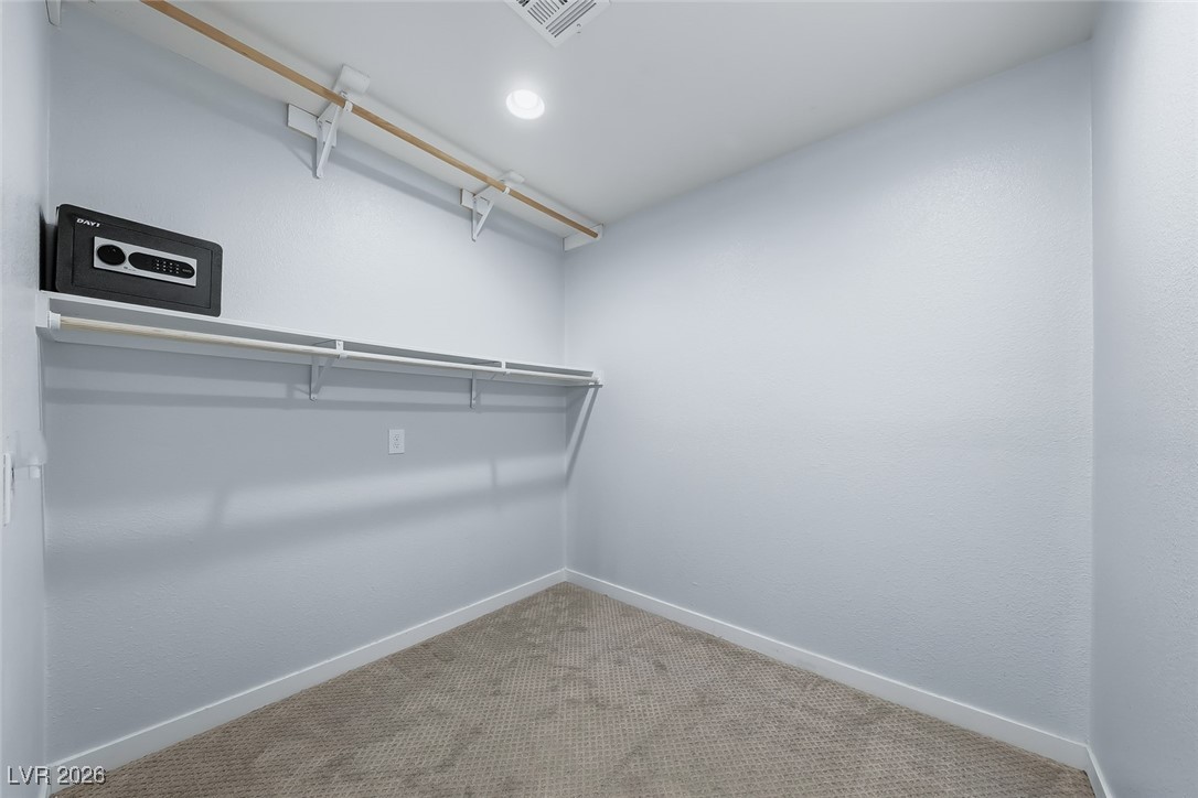 111 Copper Street Henderson, NV 89015 - Photo 7 of 47 Walk in closet featuring carpet