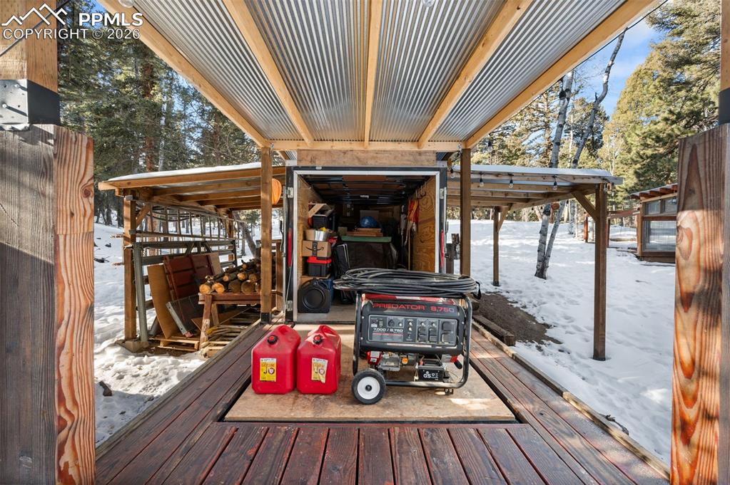 267 Kutsu Ridge Road Florissant, CO 80816 - Photo 19 of 26 a view of roof deck with patio