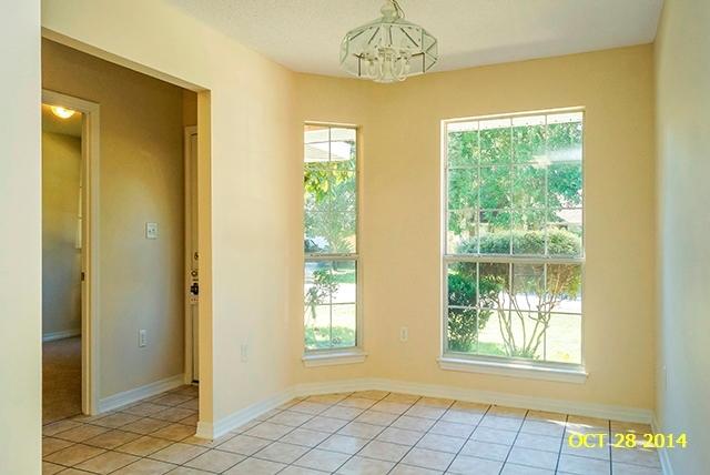 374 Beacon Way Santa Rosa Beach, FL 32459 - Photo 12 of 27 a view of an empty room with a window