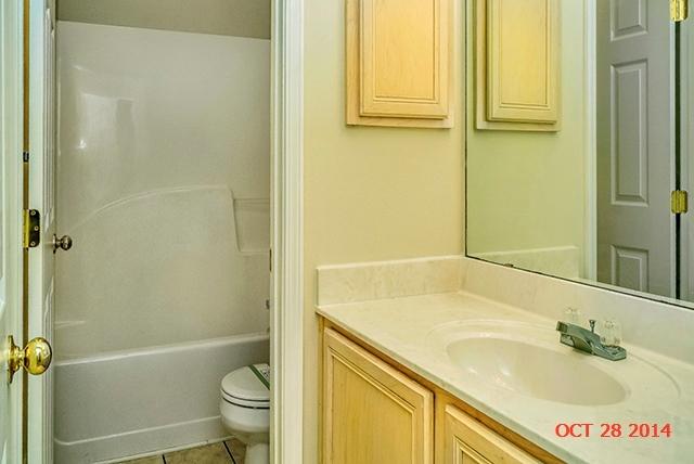 374 Beacon Way Santa Rosa Beach, FL 32459 - Photo 21 of 27 a bathroom with a sink a toilet and shower