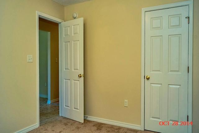 374 Beacon Way Santa Rosa Beach, FL 32459 - Photo 25 of 27 an entryway with wooden floor
