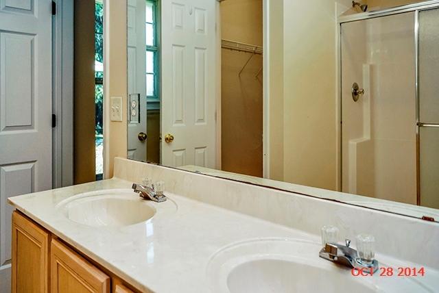 374 Beacon Way Santa Rosa Beach, FL 32459 - Photo 26 of 27 a bathroom with a sink and a mirror