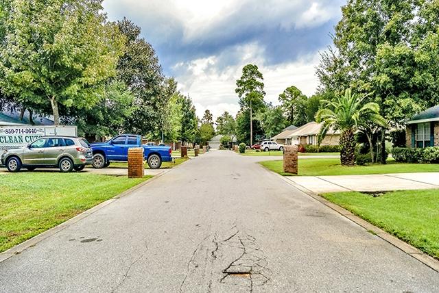 374 Beacon Way Santa Rosa Beach, FL 32459 - Photo 3 of 27 a view of street with parked cars