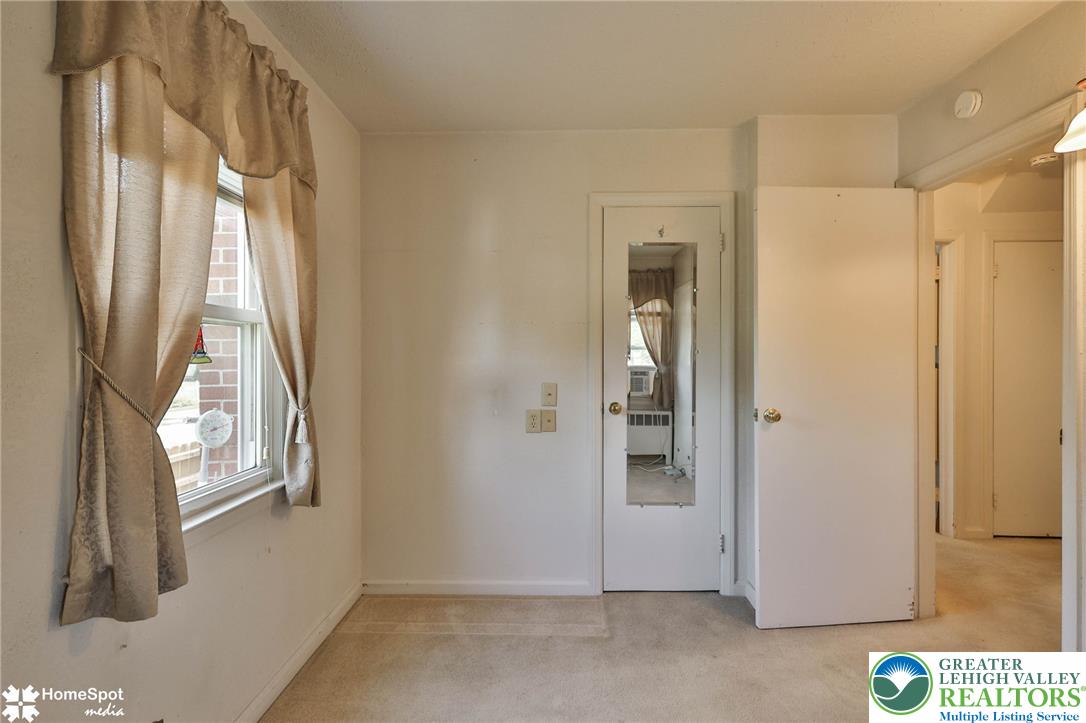 3069 Shakespeare Road Bethlehem, PA 18017 - Photo 19 of 50 An inviting room, ready for personal touches, features a sunlit window and neutral carpeting.
