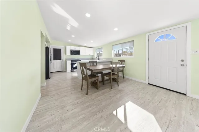 a view of a dining room with furniture