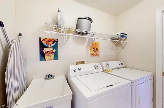 a utility room with dryer and washer