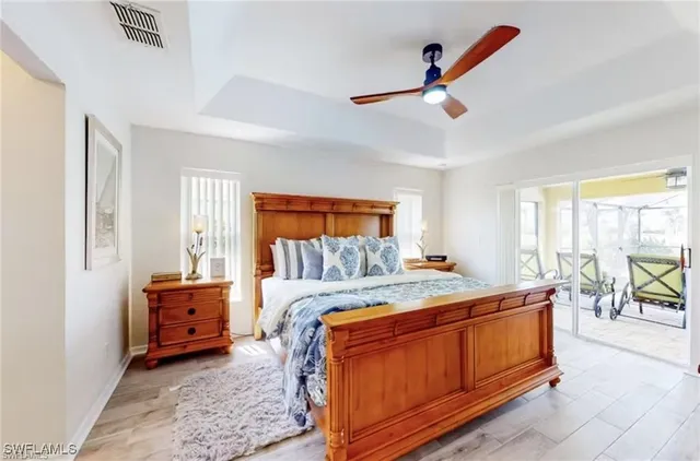 a bed room with a bed and a window