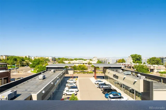 a view of swimming pool with outdoor seating