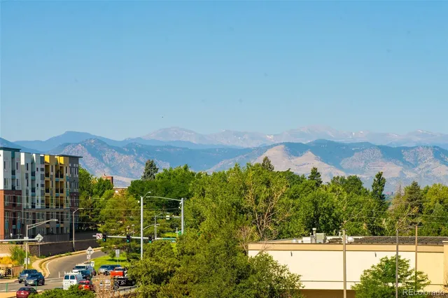 a view of a city with tall buildings