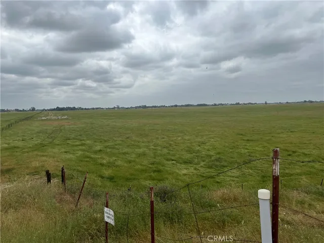 a view of lake with green space