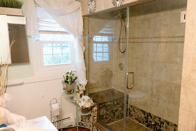 a bath room with a shower