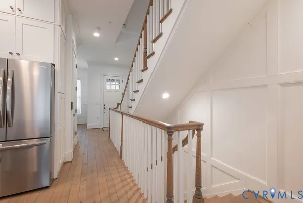 a kitchen with stainless steel appliances granite countertop a stove and a sink