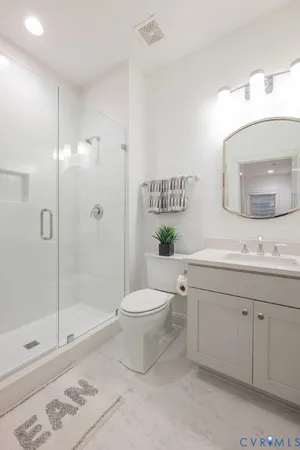 a living room with furniture and a rug