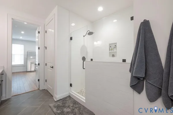 a view of a livingroom with furniture and a flat screen tv