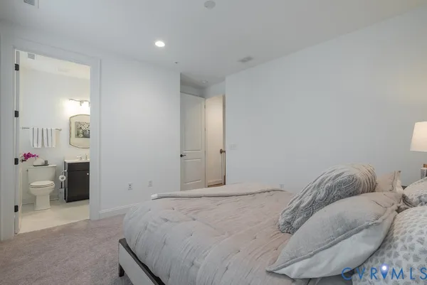 a dining room with furniture a fireplace and wooden floor