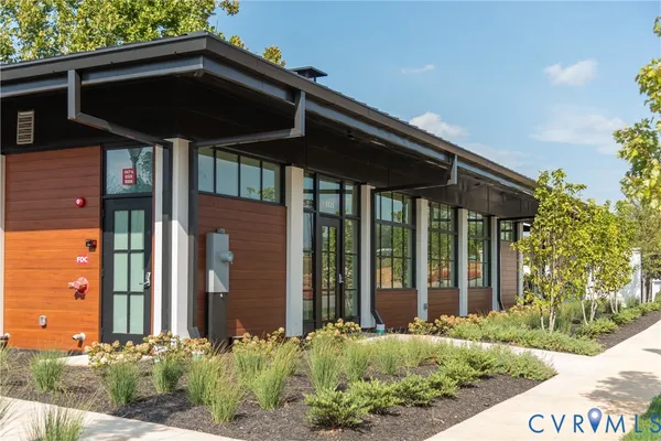 a picture of a bathroom with a shower and a mirror